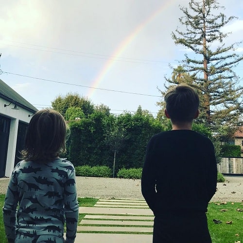 A picture of Leo Grey McElhenney with his elder brother, Alex Lee McElhenney admiring a rainbow.